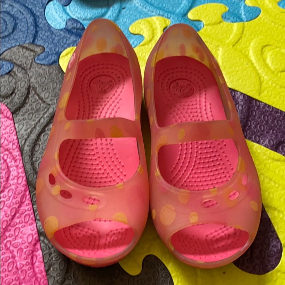 Pink and yellow CROCS